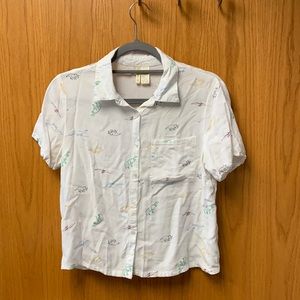 White collared dinosaur top cropped